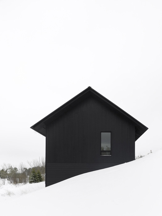 black-winter-cabin